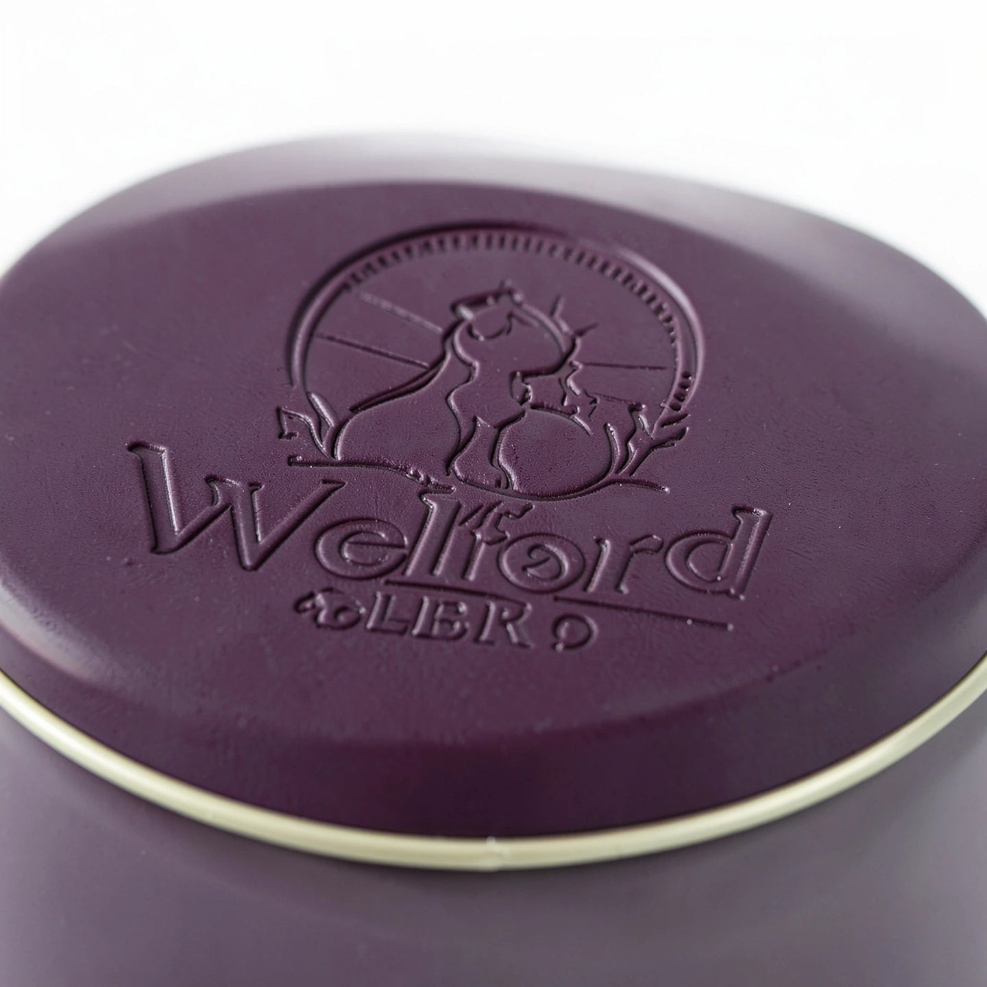Overhead flat-lay of the Welford Encore dog set with every toy laid out separately beside the open tin