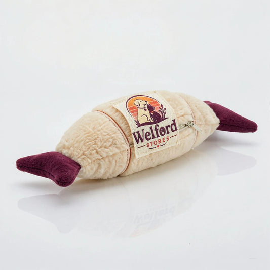 Cream plush Welford Vault catnip kicker with deep plum tail and fins on a white background