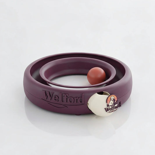 Plum Welford Give-Way orbit feeder with a terracotta ball in its circular track on a white background